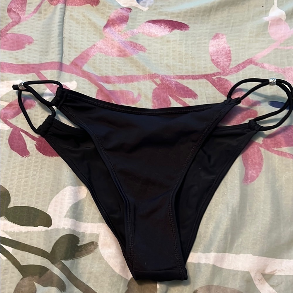 Black strappy bikini bottom.